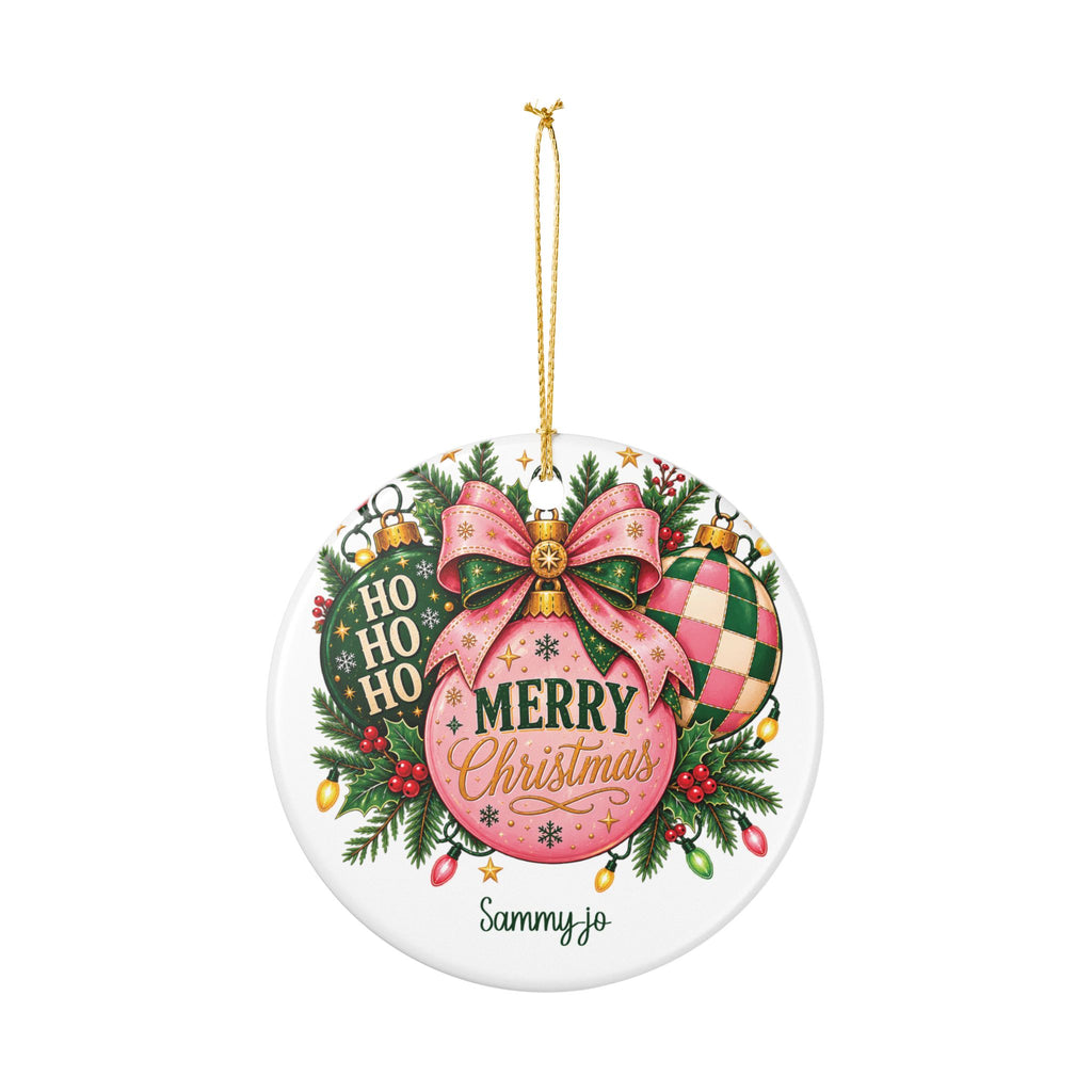 Personalized Pink Christmas Bow ornament hanging from its gold string