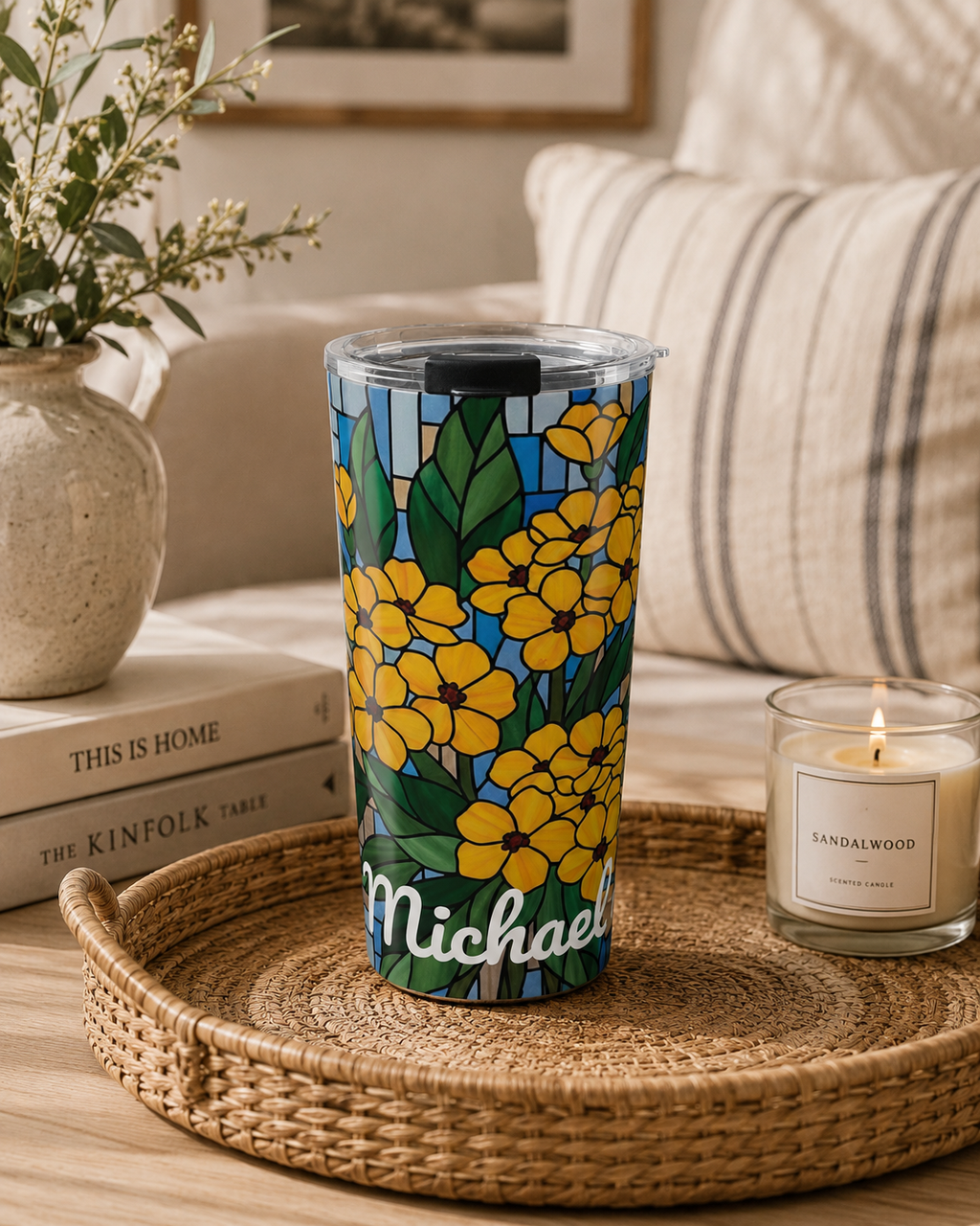 Golden stained glass floral tumbler styled in a warm lifestyle scene