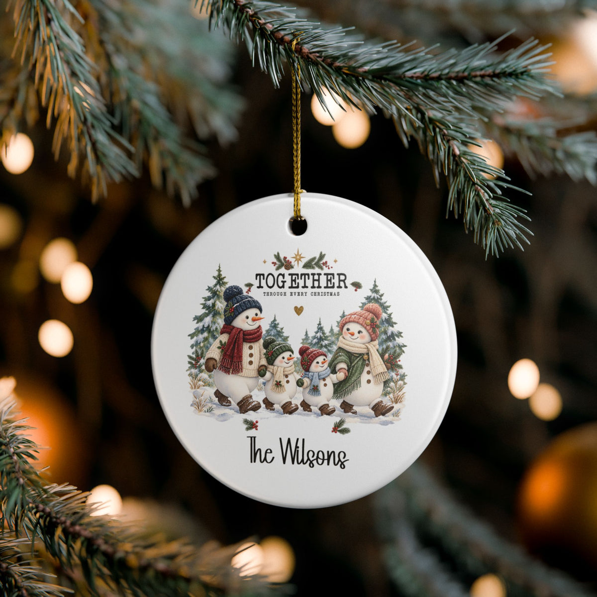 Together Through Every Christmas ornament hanging on a lit Christmas tree, lifestyle photo
