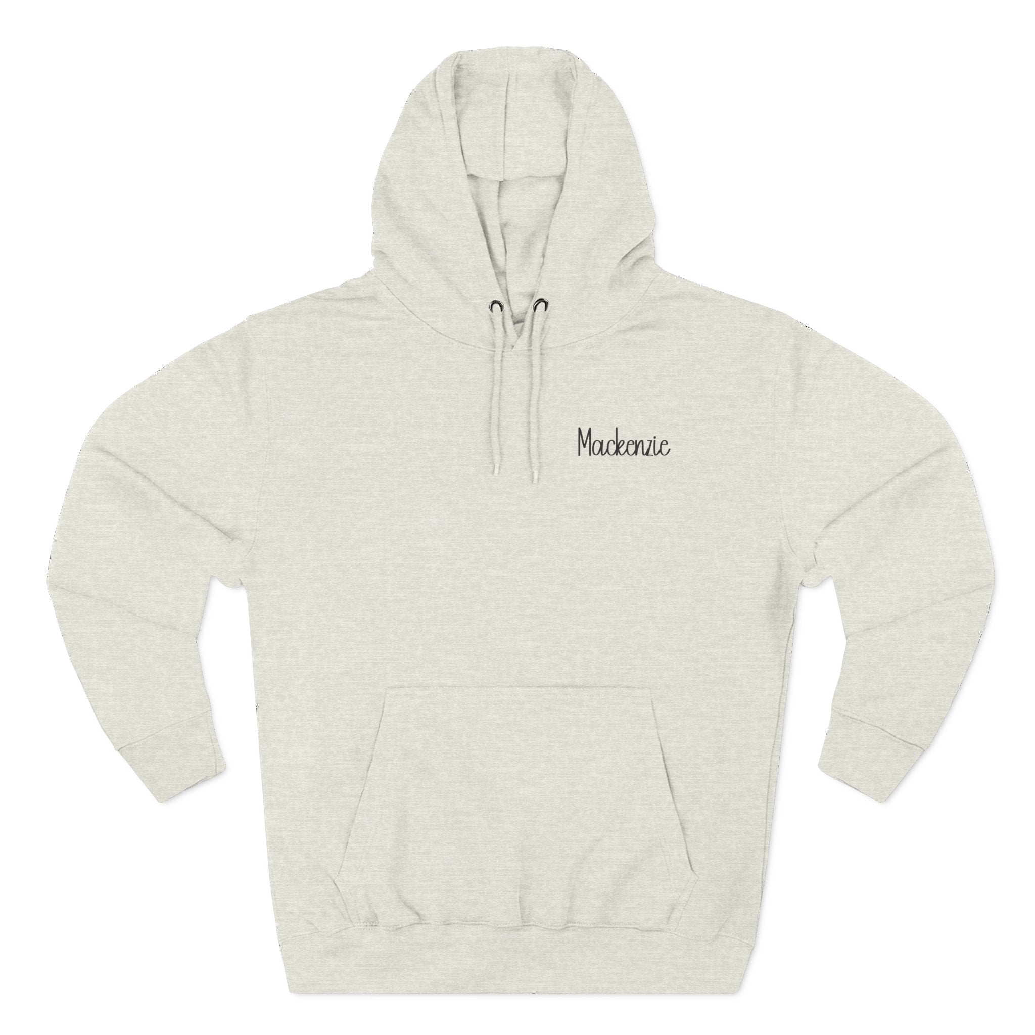 Front view of oatmeal heather hoodie with customizable name embroidered on the chest