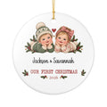 Personalized Twins First Christmas ornament with two babies in knitted Christmas hats among holly, front view