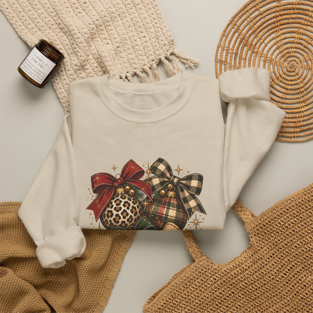 Sand personalized Vintage Christmas Ornaments sweatshirt, flat lay with cozy knit blanket