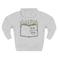 Back view of heather grey hoodie with “Write Your Own Story” design