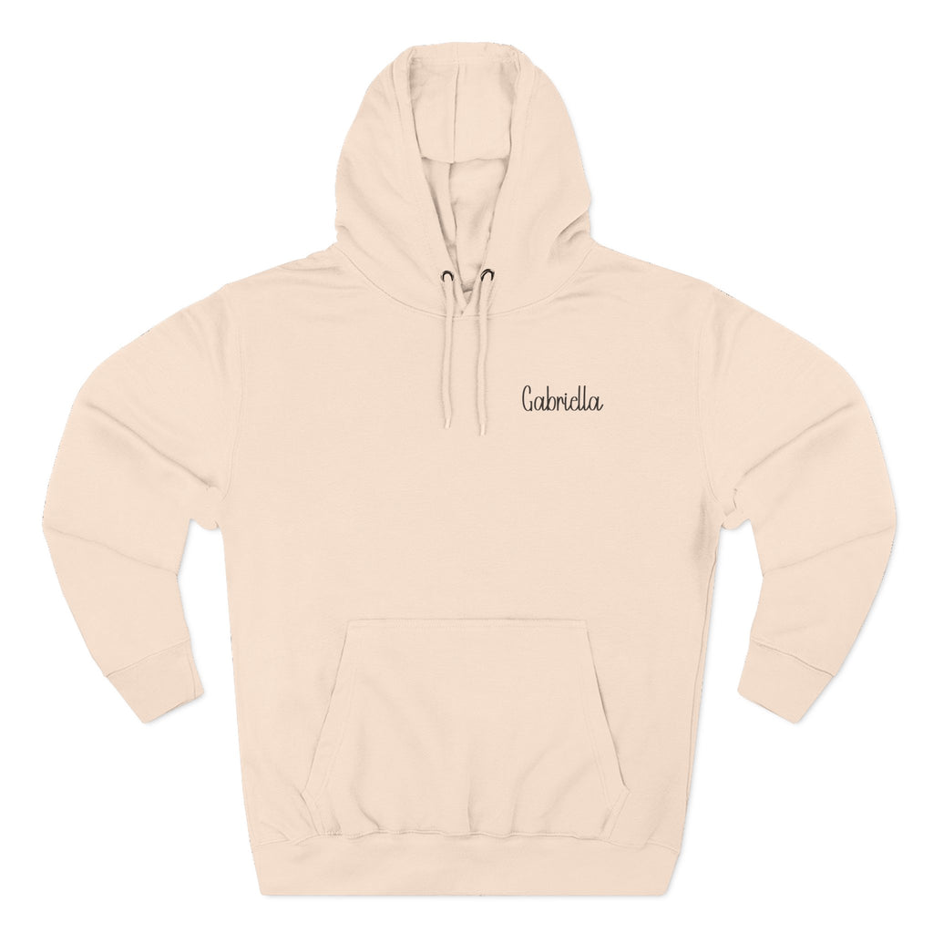 Back view of pale pink hoodie with “Write Your Own Story” design