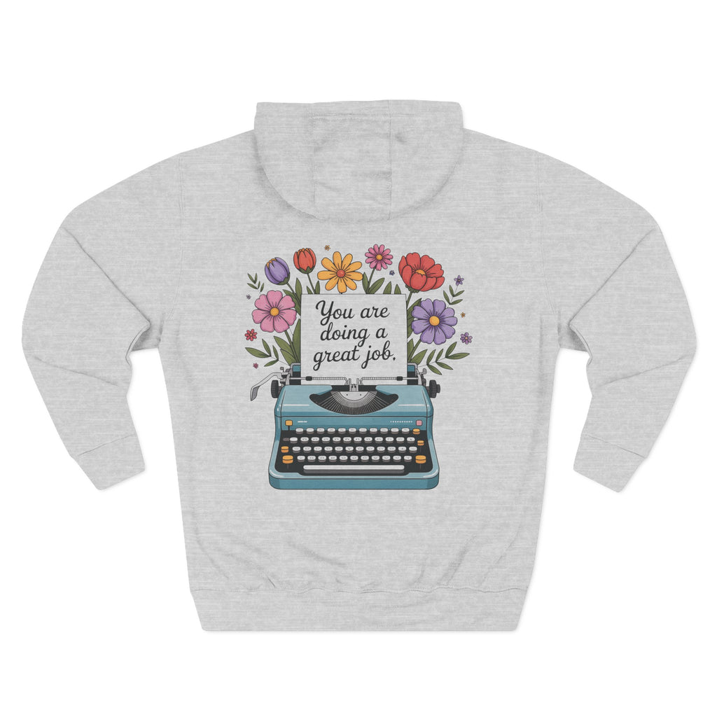 Front view of heather grey hoodie with customizable name embroidered on the chest