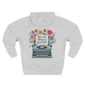 Front view of heather grey hoodie with customizable name embroidered on the chest